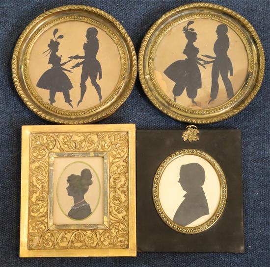 A pair of early Victorian cut paper silhouettes of dancing couples,